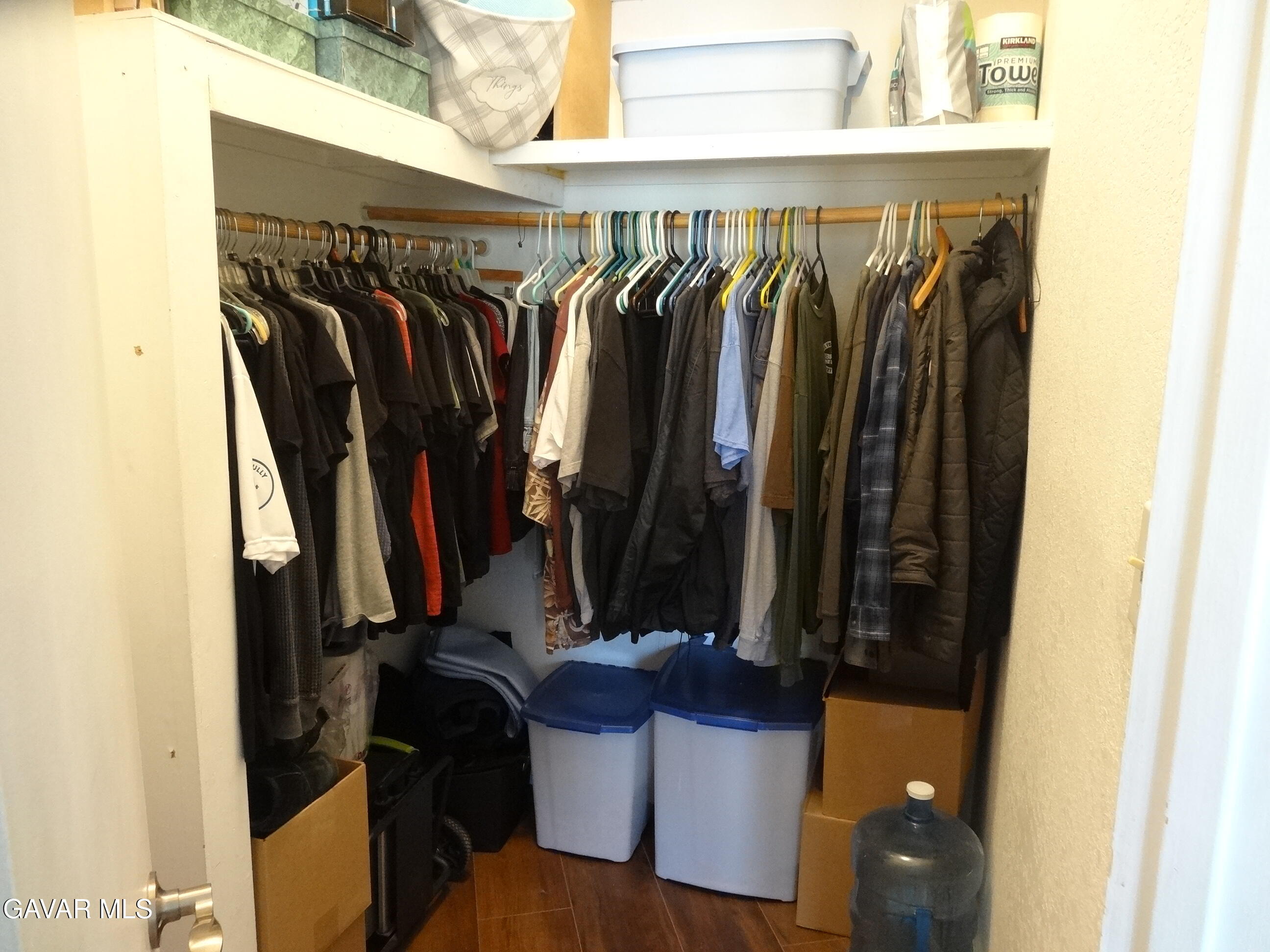 9425 Tanganda Road Tehachapi, CA 93561 - Photo 14 of 23 a view of walk in closet with clothes and shoes