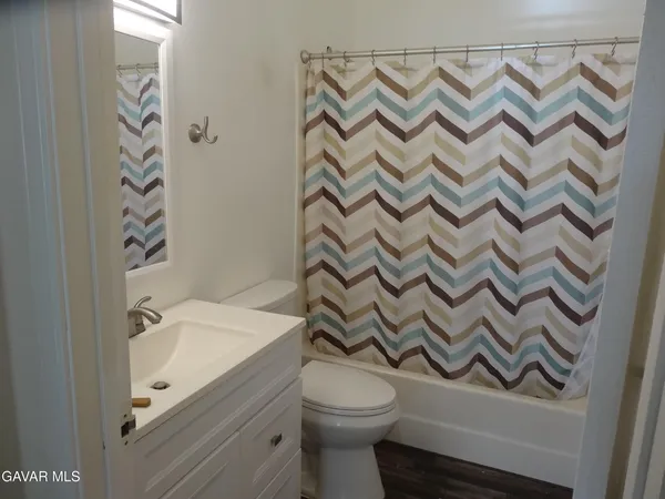 a view of a backyard with a sitting area and furniture