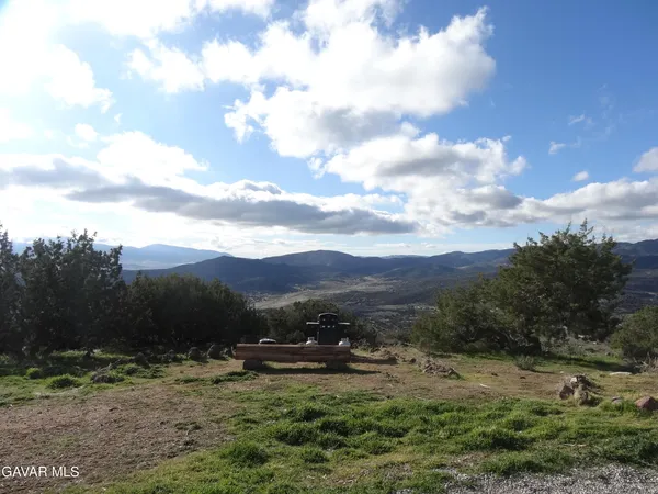 a view of outdoor space with mountain view