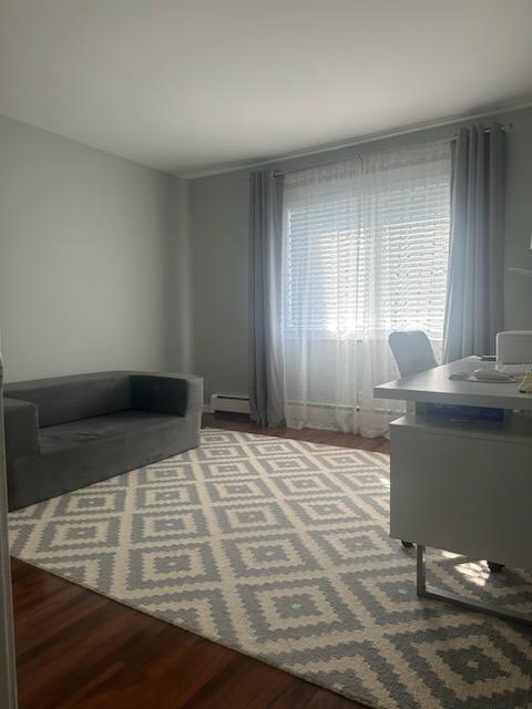 491 McHenry Road, Unit 3A Wheeling, IL 60090 - Photo 14 of 17 a bedroom with a bed and window