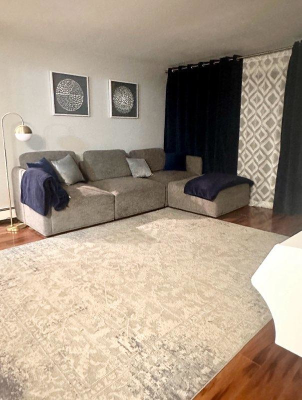 491 McHenry Road, Unit 3A Wheeling, IL 60090 - Photo 3 of 17 a living room with furniture and a couch