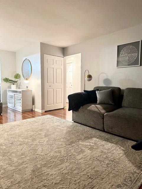 491 McHenry Road, Unit 3A Wheeling, IL 60090 - Photo 4 of 17 a living room with furniture and a window