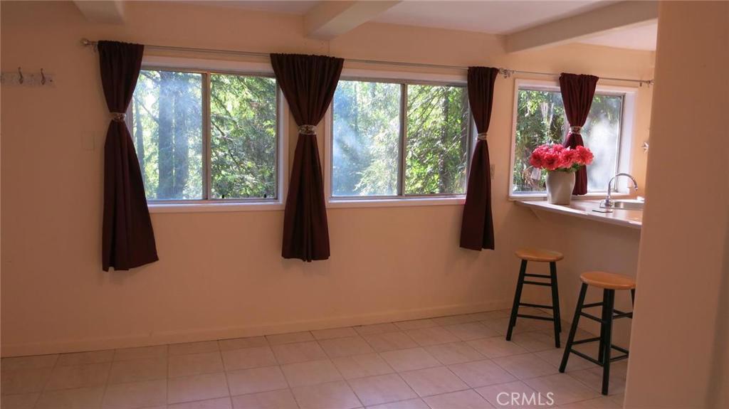 21455 Delta Way, Unit 1 Monte Rio, CA 95462 - Photo 3 of 38 Living room and kitchen areas.