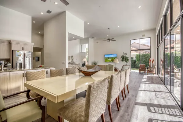 a kitchen with a sink a counter and cabinets