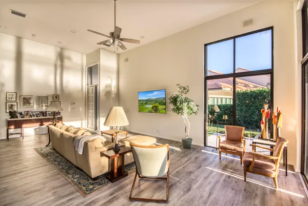 a bathroom with a double vanity sink mirror and shower