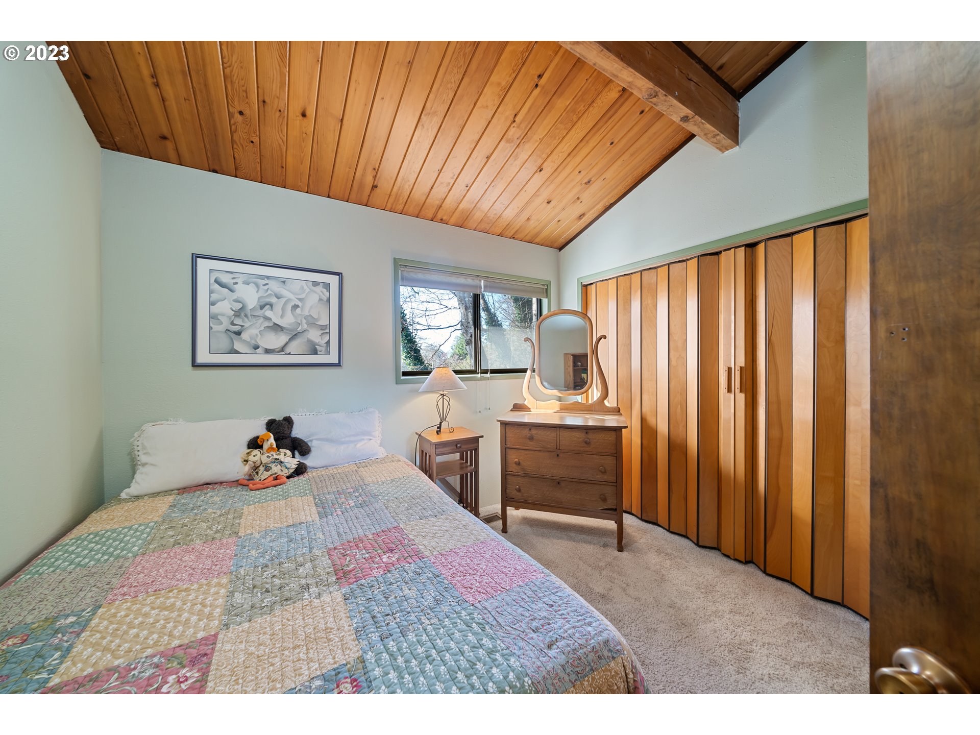 38475 Beulah Reed Road Nehalem, OR 97131 - Photo 7 of 31 a bedroom with furniture and a window