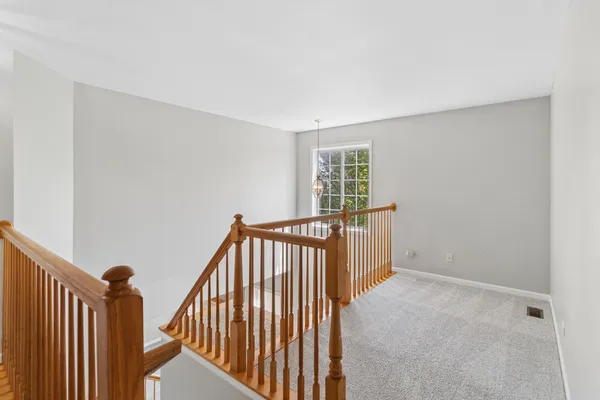 a view of entryway with stairs