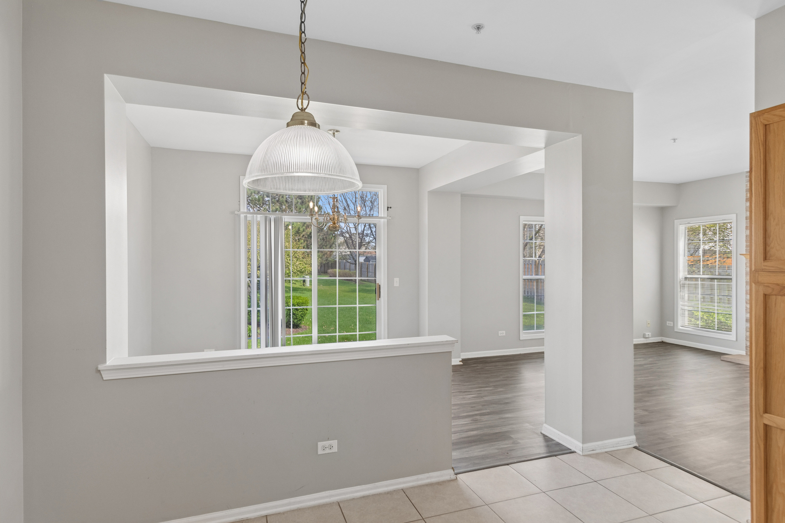 2075 Ivy Ridge Drive Hoffman Estates, IL 60192 - Photo 9 of 20 a view of an entryway with wooden floor