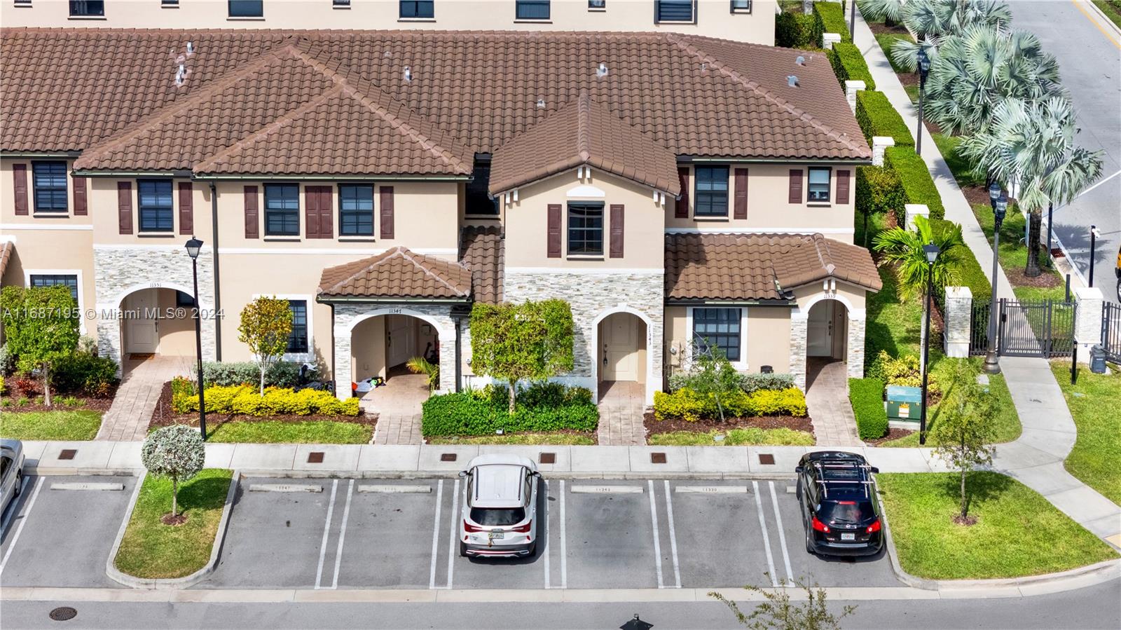 11343 Southwest 250th Terrace, Unit 11343 Homestead, FL 33032 - Photo 2 of 37 front view of house with a garden view