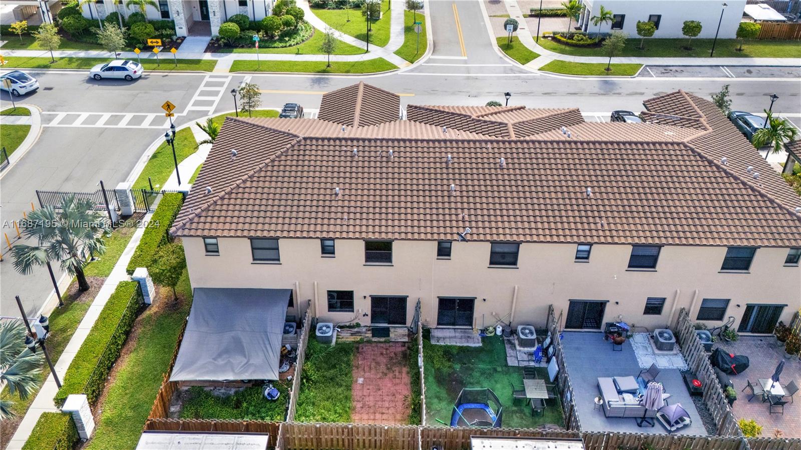 11343 Southwest 250th Terrace, Unit 11343 Homestead, FL 33032 - Photo 27 of 37 an aerial view of a house with a yard