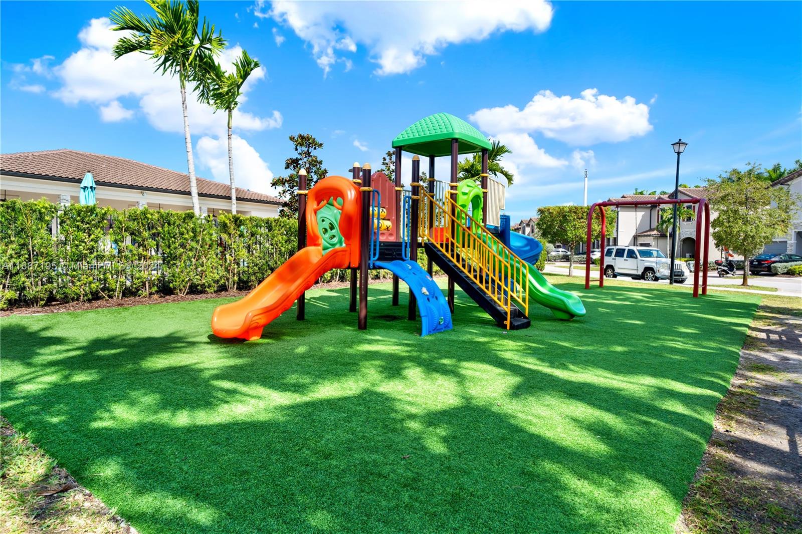 11343 Southwest 250th Terrace, Unit 11343 Homestead, FL 33032 - Photo 37 of 37 a view of a park with a slide