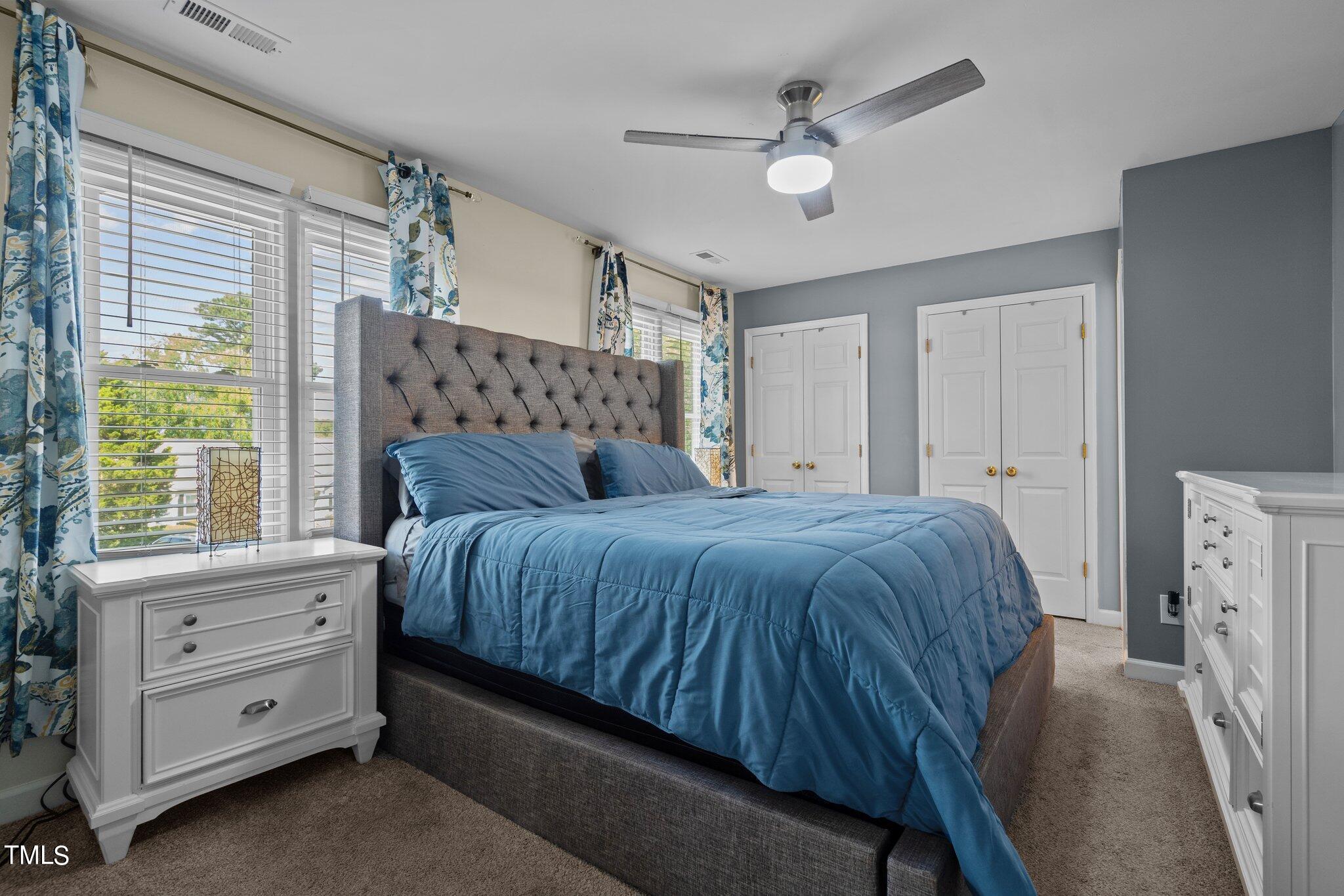 3520 Rawdon Drive Durham, NC 27713 - Photo 16 of 30 a bedroom with a large bed and a window
