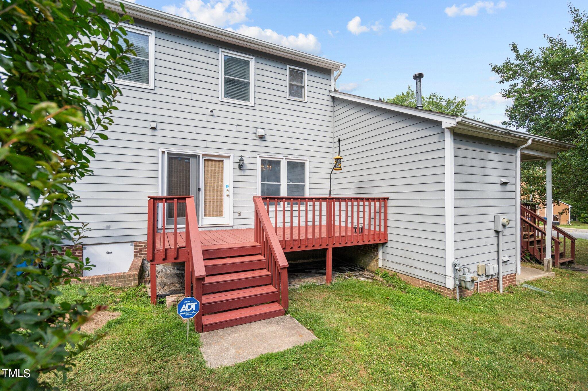 3520 Rawdon Drive Durham, NC 27713 - Photo 23 of 30 a front view of a house with a garden