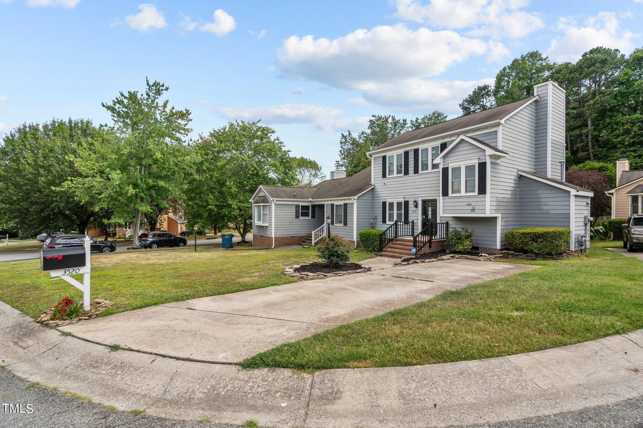 3520 Rawdon Drive Durham, NC 27713 - Photo 26 of 30 a front view of house with yard and green space