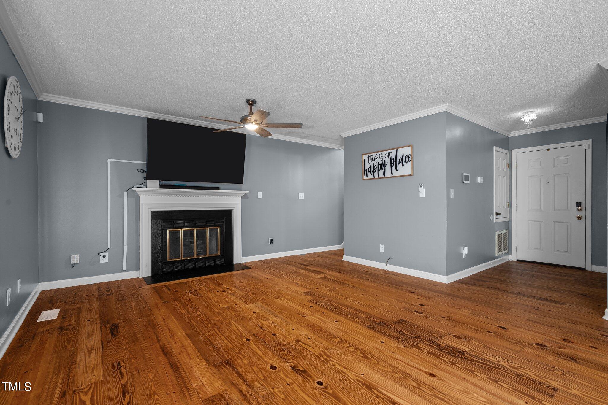 3520 Rawdon Drive Durham, NC 27713 - Photo 3 of 30 a view of empty room with a fireplace