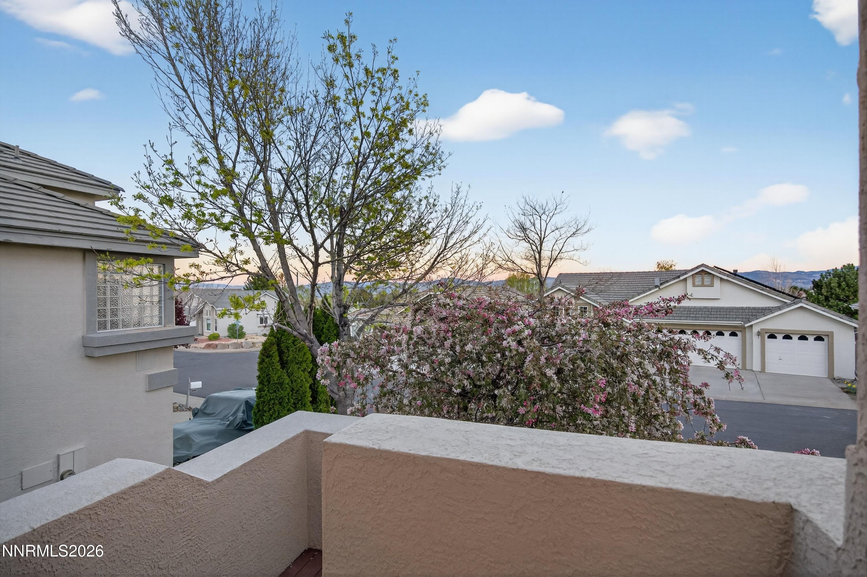 6279 Golden Meadow Road Reno, NV 89519 - Photo 23 of 57 a view of a house with a street