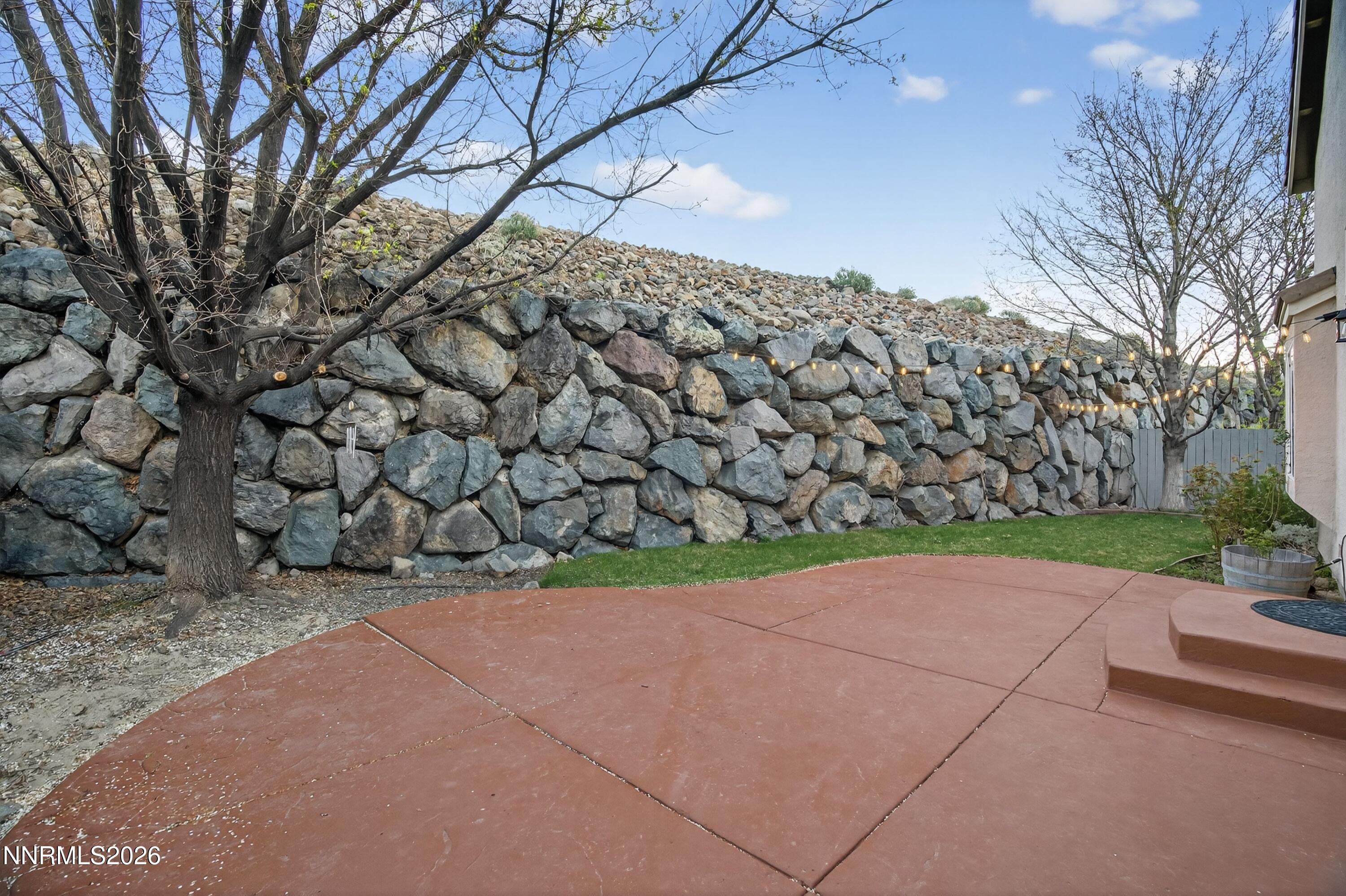 6279 Golden Meadow Road Reno, NV 89519 - Photo 42 of 57 a view of a road with a yard