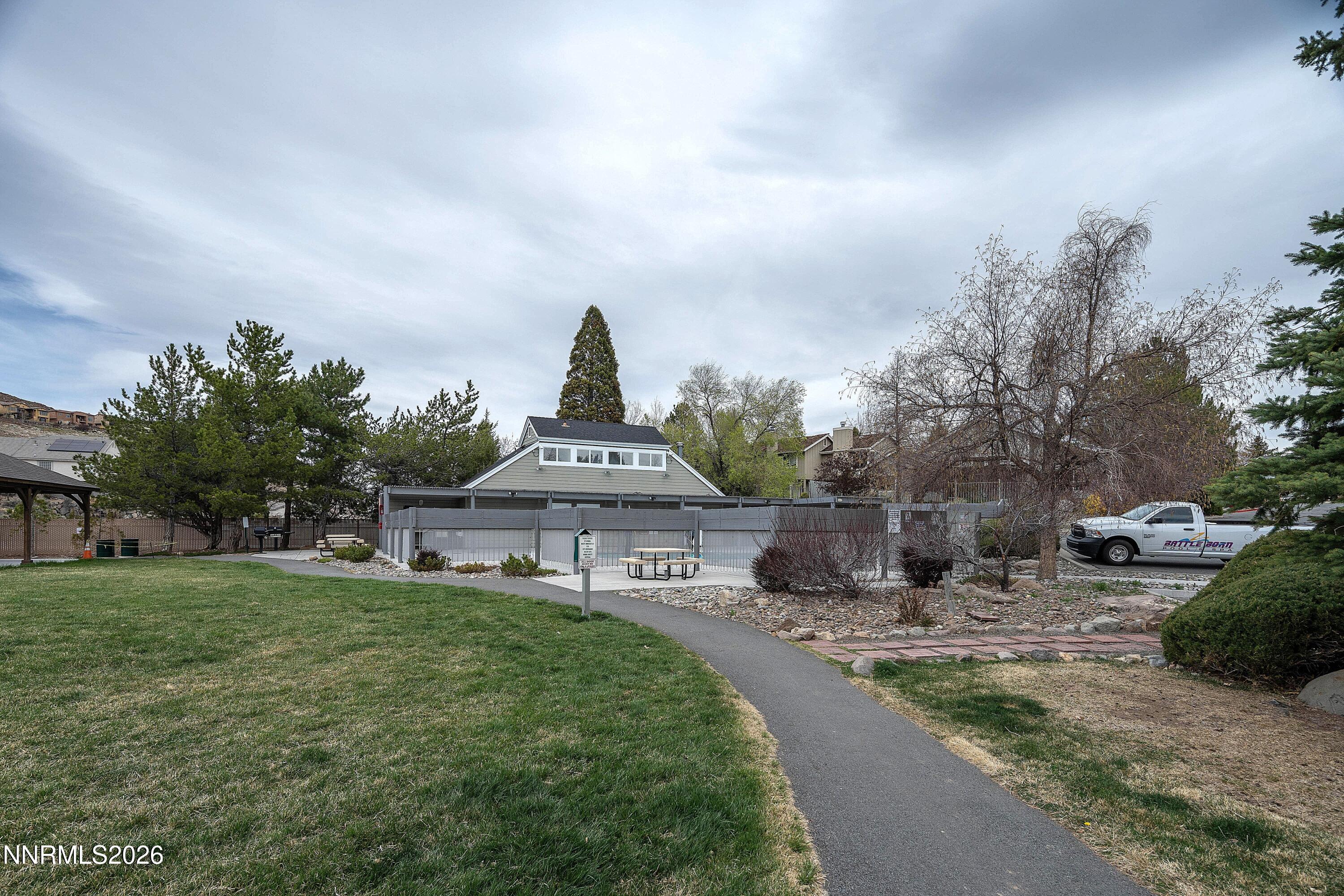 6279 Golden Meadow Road Reno, NV 89519 - Photo 50 of 57 a view of a house with a yard