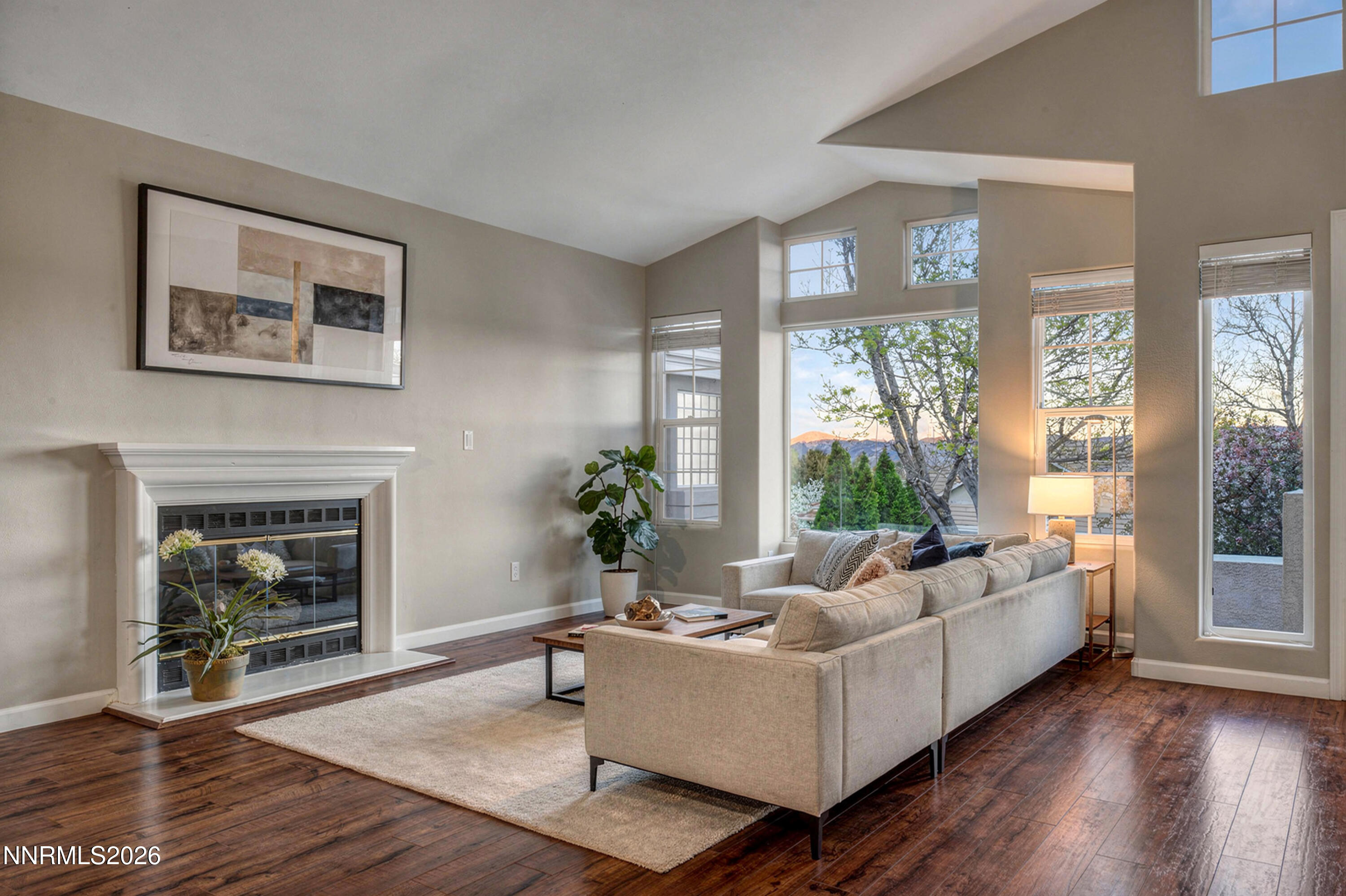6279 Golden Meadow Road Reno, NV 89519 - Photo 5 of 57 a living room with furniture and a fireplace