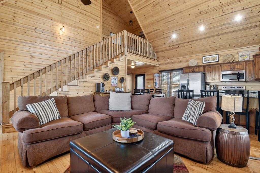 78 Brass Hill Road Blue Ridge, GA 30513 - Photo 13 of 44 a living room with furniture and kitchen view