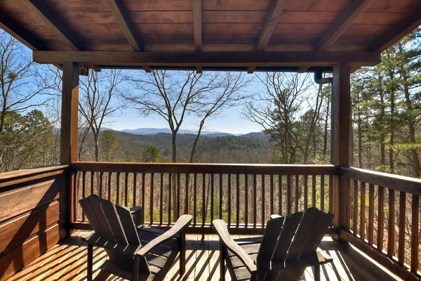 a view of trees from a balcony