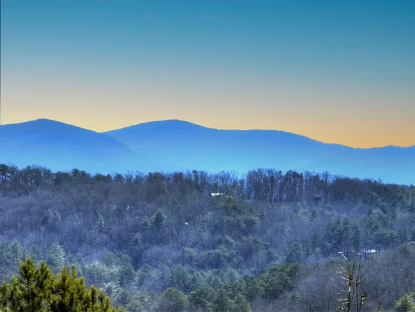 a view of mountains and valleys