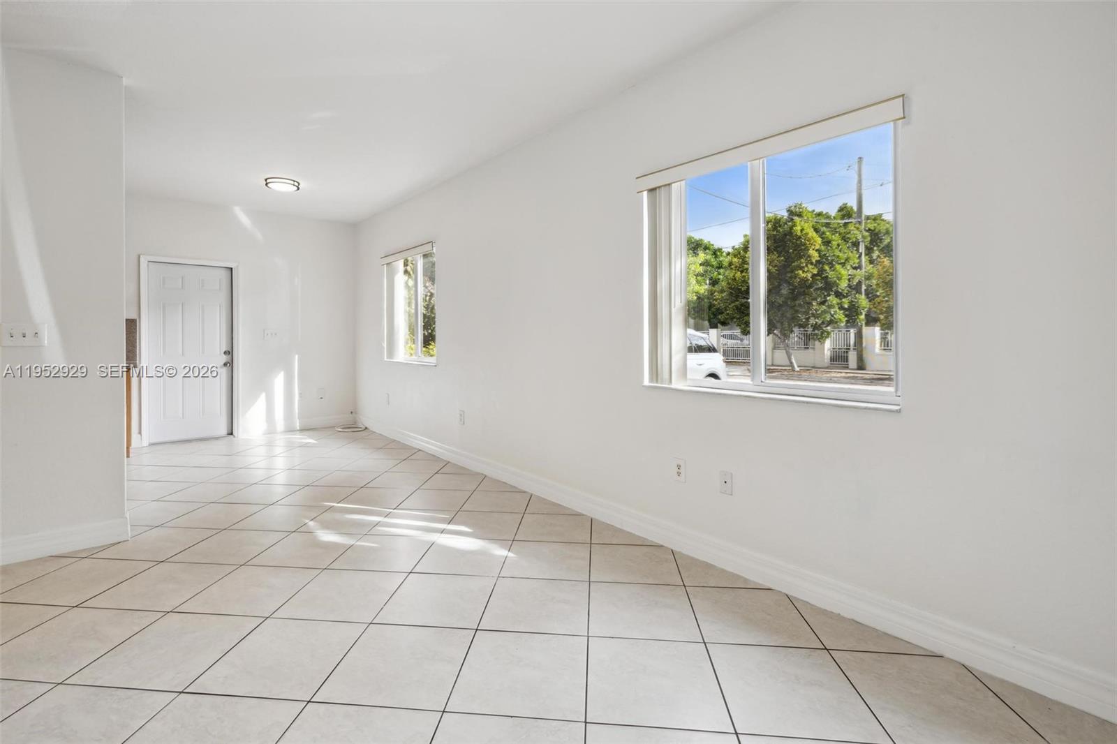 3134 Hibiscus Street, Unit 3134 Miami, FL 33133 - Photo 12 of 21 a view of an empty room with a window