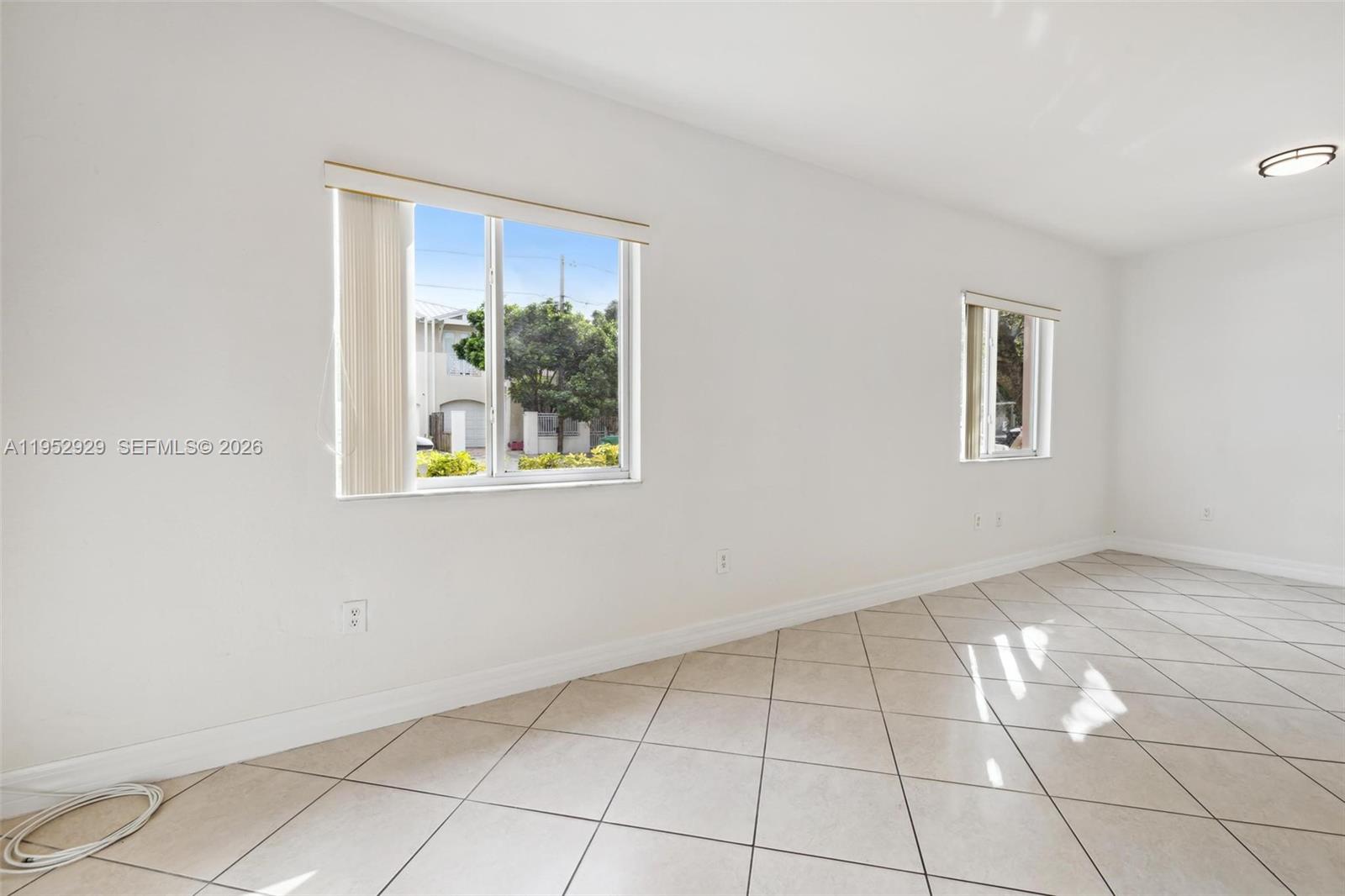 3134 Hibiscus Street, Unit 3134 Miami, FL 33133 - Photo 19 of 21 a view of an empty room with a window
