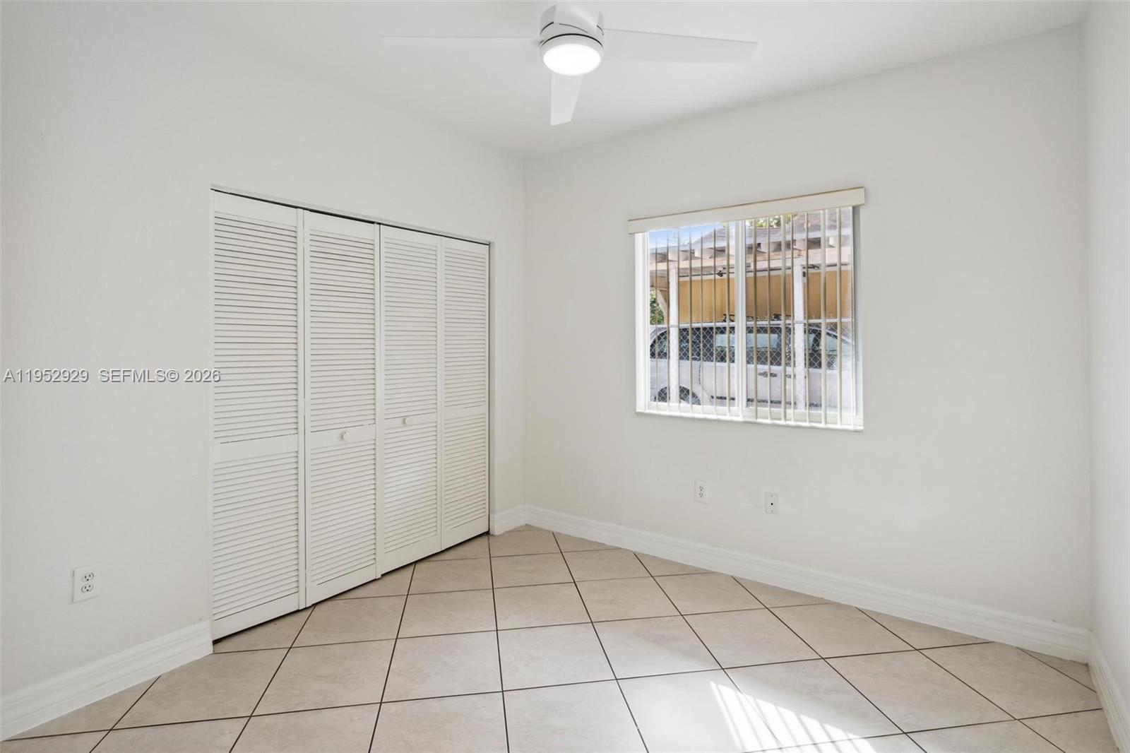 3134 Hibiscus Street, Unit 3134 Miami, FL 33133 - Photo 7 of 21 an empty room with windows