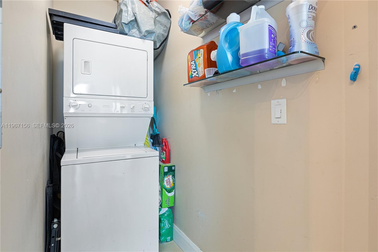 2525 Southwest 3rd Avenue, Unit 1708 Miami, FL 33129 - Photo 19 of 26 a utility room with dryer and washer