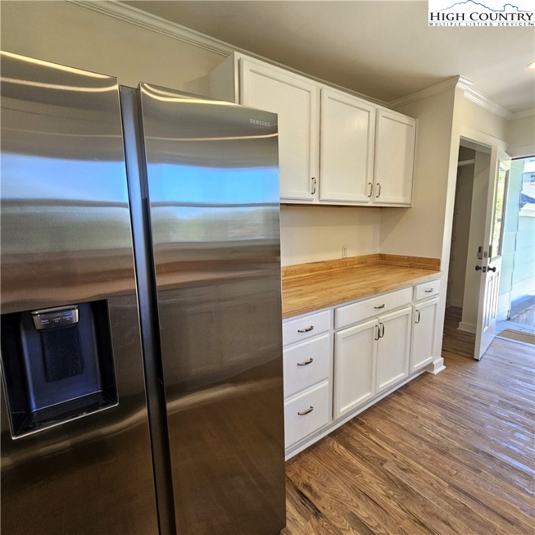 254 Green Street Boone, NC 28607 - Photo 11 of 48 a kitchen with cabinets and stainless steel appliances