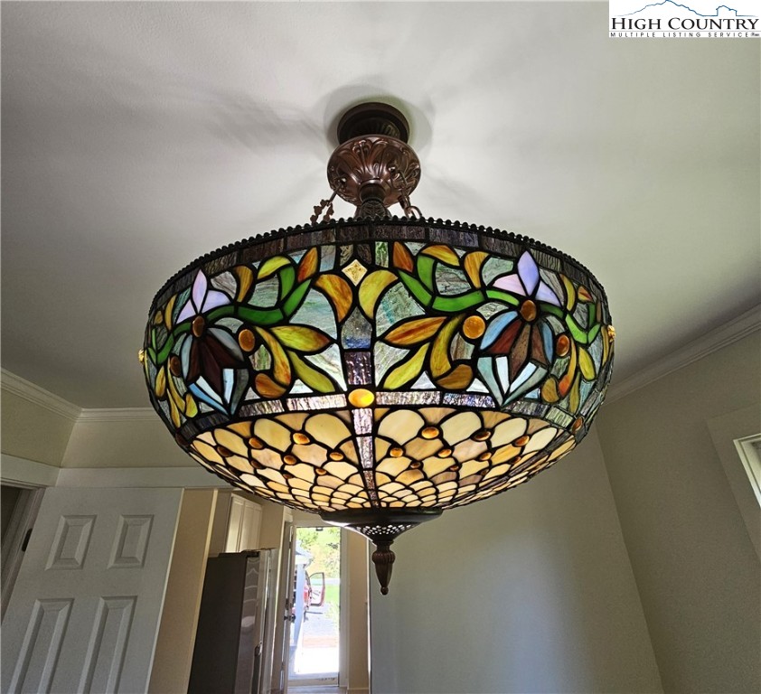 254 Green Street Boone, NC 28607 - Photo 19 of 48 a view of a vase of flowers sitting on a table