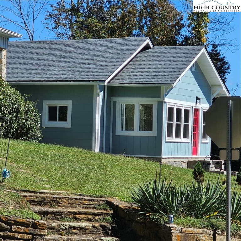 254 Green Street Boone, NC 28607 - Photo 2 of 48 a view of a house with garden