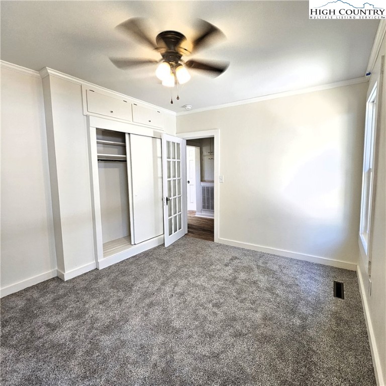 254 Green Street Boone, NC 28607 - Photo 27 of 48 an empty room with a empty space and a ceiling fan