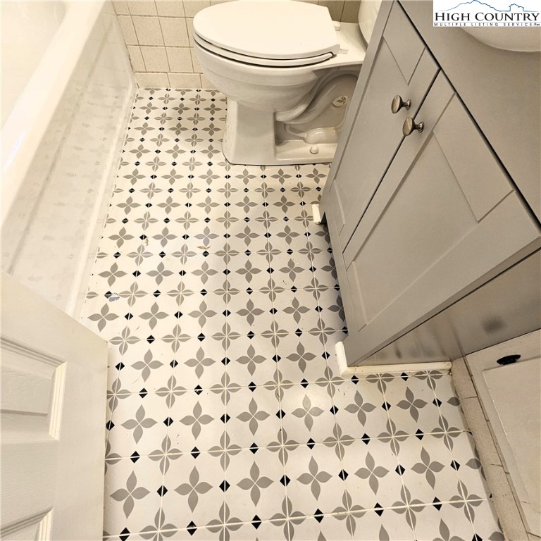 254 Green Street Boone, NC 28607 - Photo 33 of 48 a bathroom with a toilet and a shower