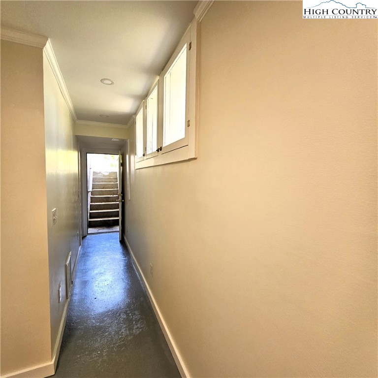 254 Green Street Boone, NC 28607 - Photo 38 of 48 a view of a hallway with wooden floor and staircase