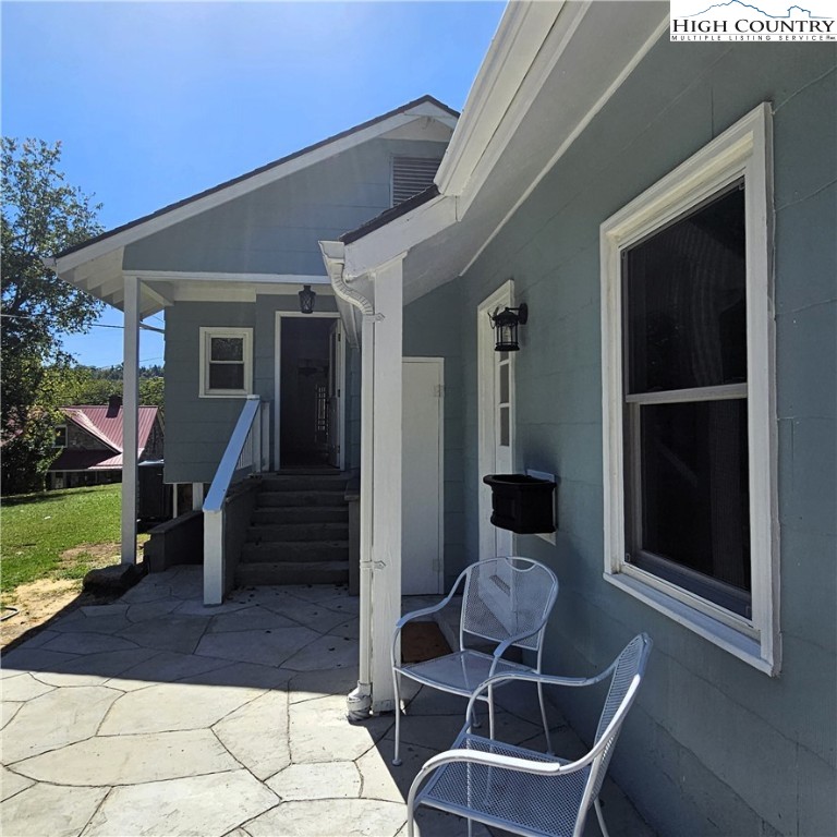 254 Green Street Boone, NC 28607 - Photo 39 of 48 a view of a patio with table and chairs