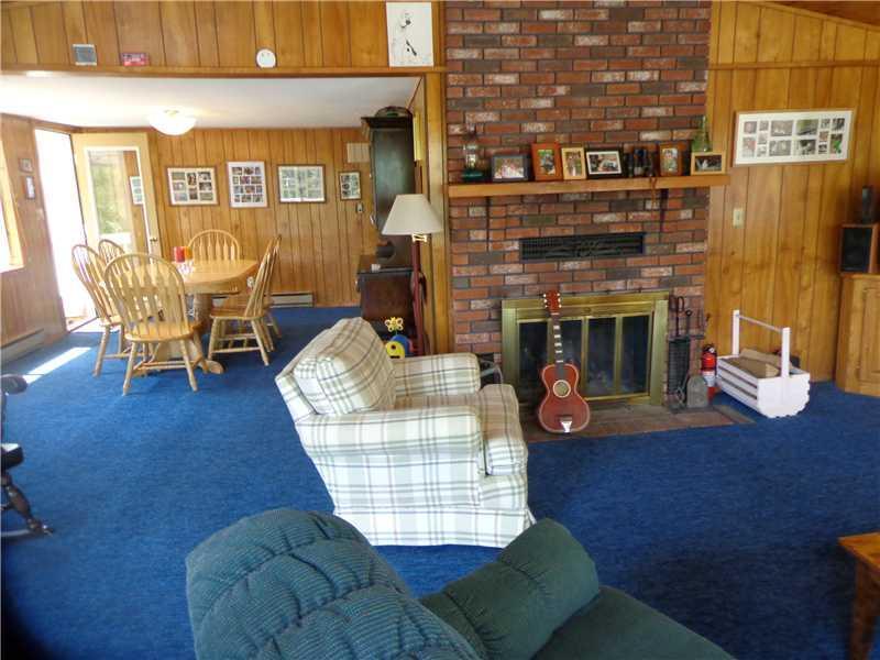 74 Deer Acres Road Raymond, ME 04071 - Photo 7 of 35 Living Room. Opens to the dining room