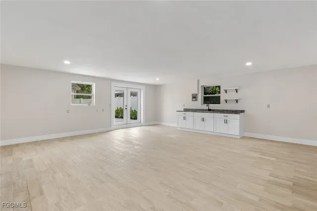 a view of a kitchen with a sink