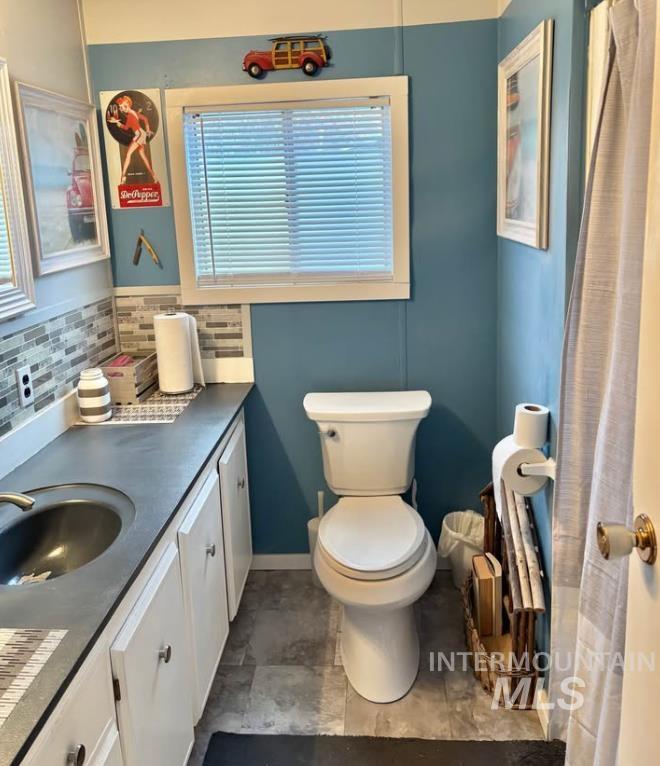 3181 West Alpine Street, Unit 22 Boise, ID 83705 - Photo 15 of 24 Full bath with vanity and curtained shower
