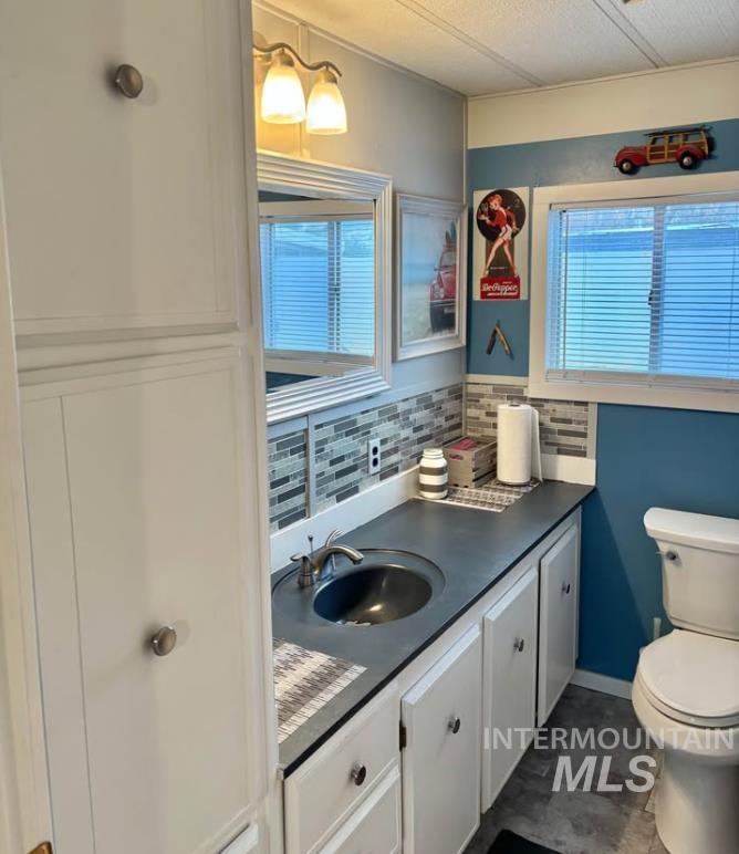 3181 West Alpine Street, Unit 22 Boise, ID 83705 - Photo 16 of 24 Bathroom with vanity and toilet