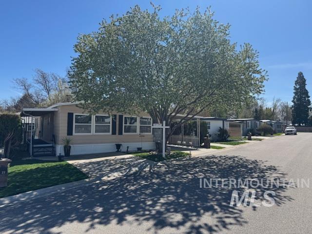 3181 West Alpine Street, Unit 22 Boise, ID 83705 - Photo 2 of 24 Manufactured / mobile home with driveway