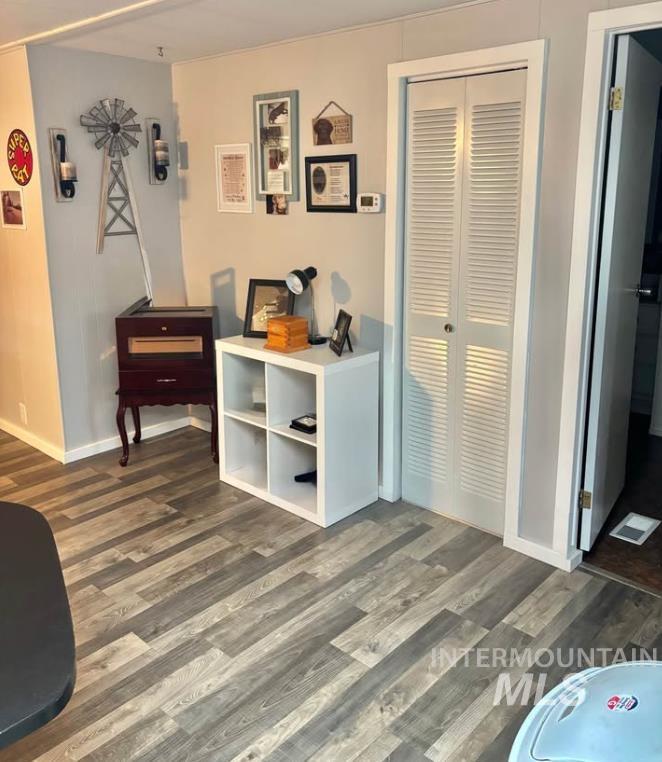 3181 West Alpine Street, Unit 22 Boise, ID 83705 - Photo 5 of 24 Interior space with dark wood finished floors