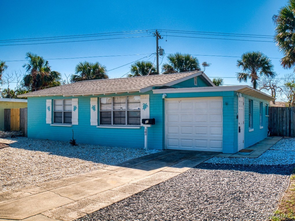 37 Ocean Shore Drive Ormond Beach, FL 32176 - Photo 2 of 50 a front view of a house with a yard