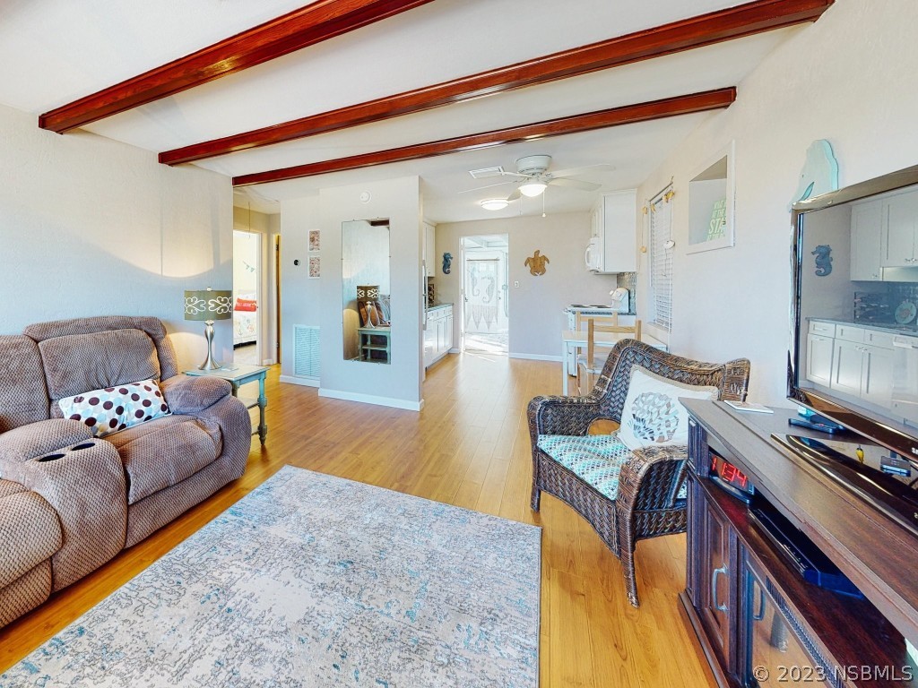 37 Ocean Shore Drive Ormond Beach, FL 32176 - Photo 5 of 50 a living room with furniture and a piano