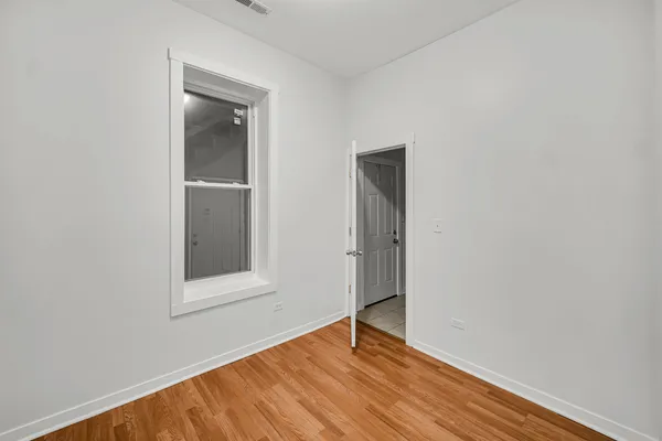 a view of a room that has a window in it