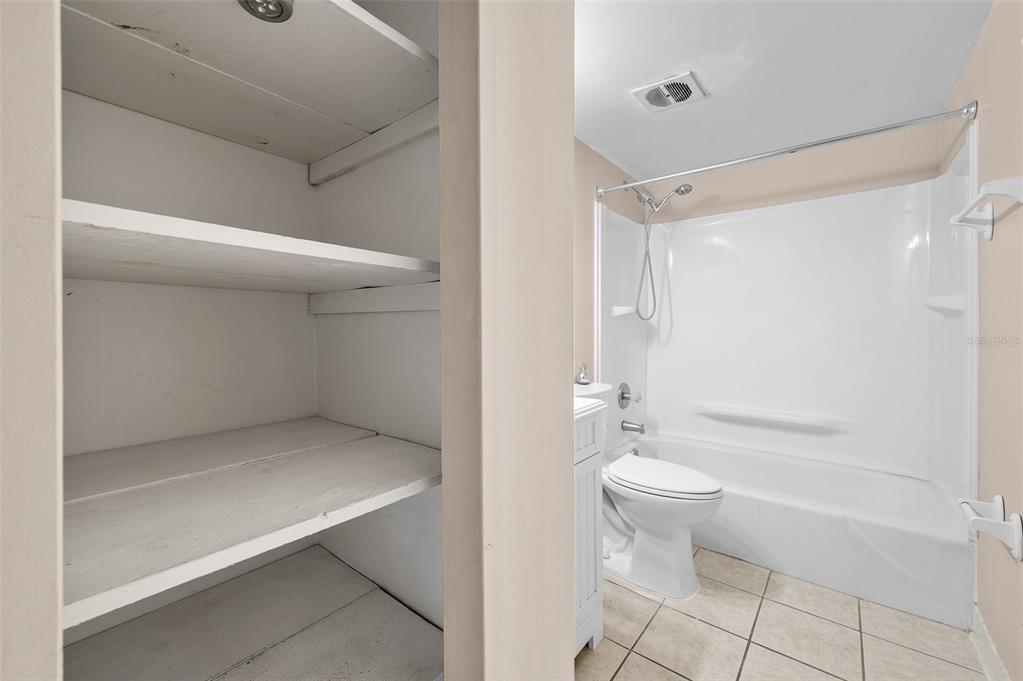 1700 Southwest 16th Court, Unit D24 Gainesville, FL 32608 - Photo 17 of 25 a bathroom with a toilet sink and shower