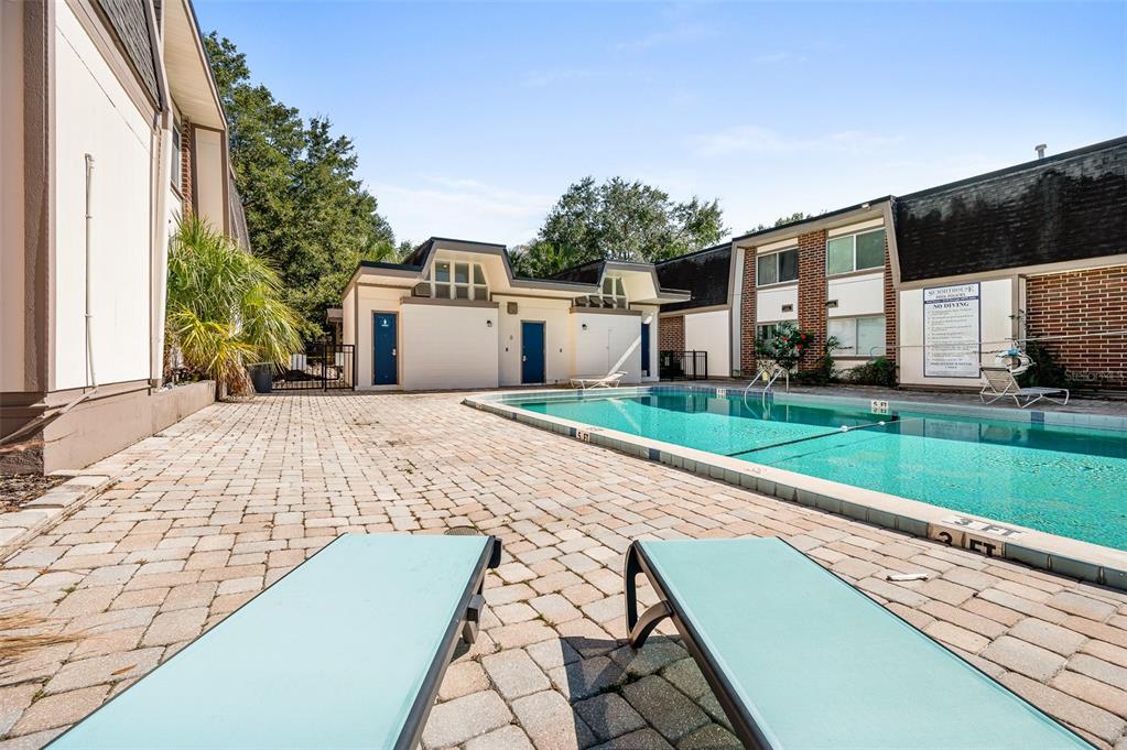 1700 Southwest 16th Court, Unit D24 Gainesville, FL 32608 - Photo 20 of 25 a view of a backyard with a garden