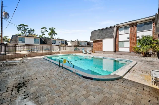 a view of a house with a swimming pool