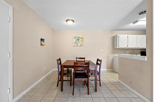 a view of a dining room with furniture